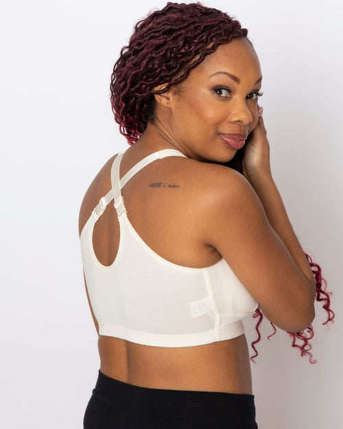 Ivory / Flat & pocketed front closure wire free bra with adjustable straps on flat model back view