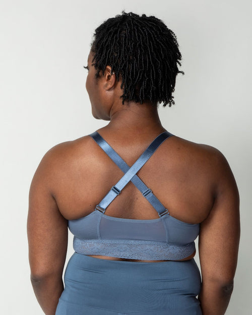 Slate / Implants & longline pullover bra with a lace trim, soft cups, mesh back, adjustable straps on model.