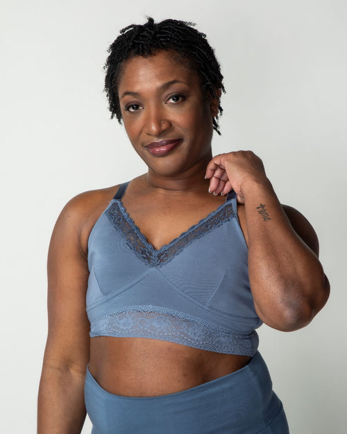 Slate / Implants & longline pullover bra with a lace trim, soft cups, mesh back, adjustable straps on model.
