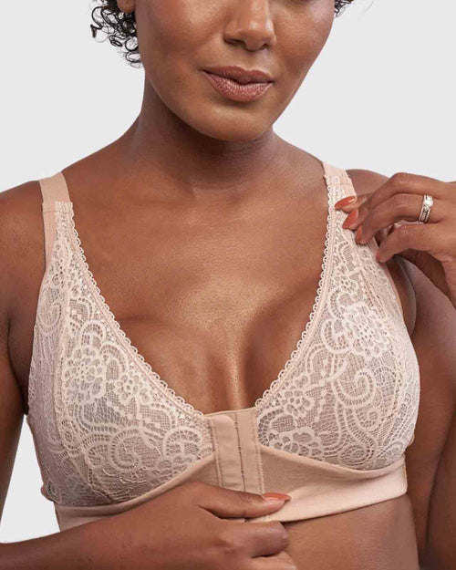 Champagne / Implants & pocketed front closure lace bra made with soft modal, dual adjustable back straps and underwire free cups on implant reconstruction model.