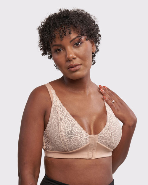 Champagne / Implants & pocketed front closure lace bra made with soft modal, dual adjustable back straps and underwire free cups on implant reconstruction model.