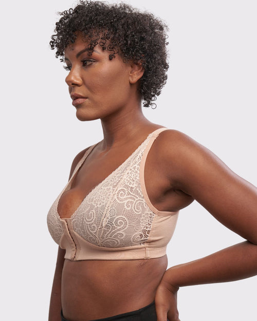 Champagne / Implants & pocketed front closure lace bra made with soft modal, dual adjustable back straps and underwire free cups on implant reconstruction model.