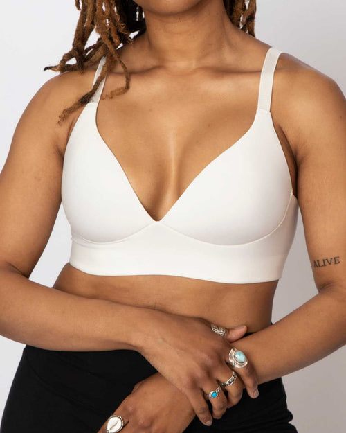 Ivory / Implants & molded cup bra contour chest with adjustable straps on implant reconstruction model chest view