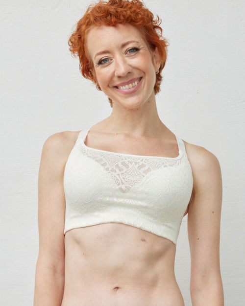Ivory / Implants & pocketed lace molded cup bra on implant reconstruction model, pocketed for breast forms front view of model