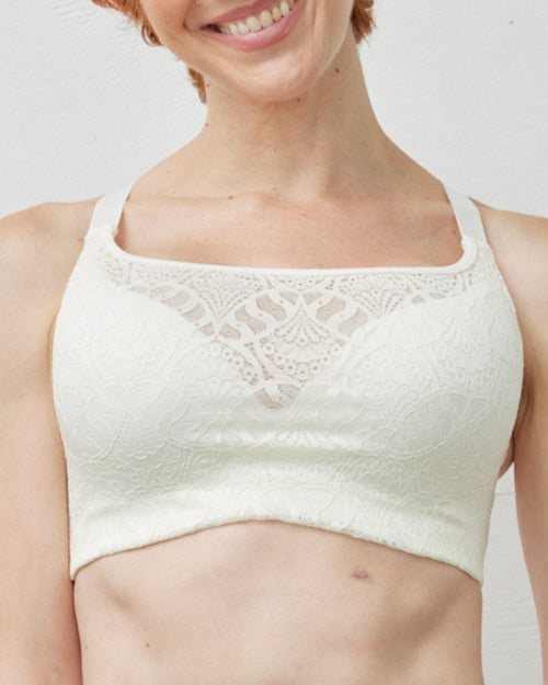 Ivory / Implants & pocketed lace molded cup bra on implant reconstruction model, pocketed for breast forms front view of model
