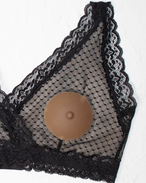 Cashew & flat lay image of all 3 colors of the perkie nipple sets with their matching nipple cases