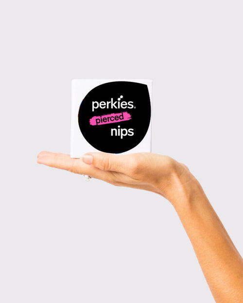 Almond & perkies pierced nipples in the medium shade with the perkies packaging featured